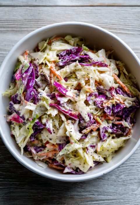 Gordon Ramsay coleslaw recipe with shredded red and white cabbage in yoghurt mustard dressing