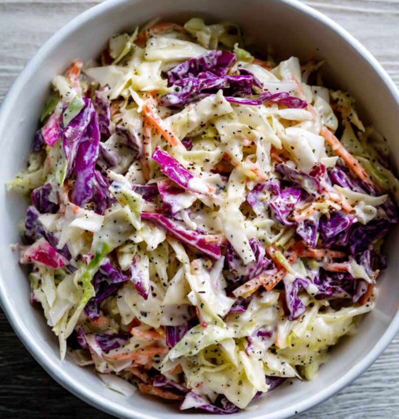 Gordon Ramsay coleslaw recipe with shredded red and white cabbage in yoghurt mustard dressing