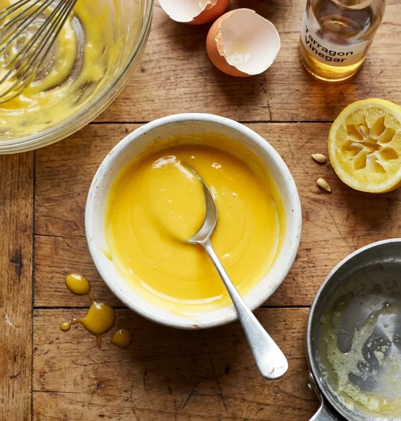 Gordon Ramsay hollandaise sauce bright golden yellow in a white bowl