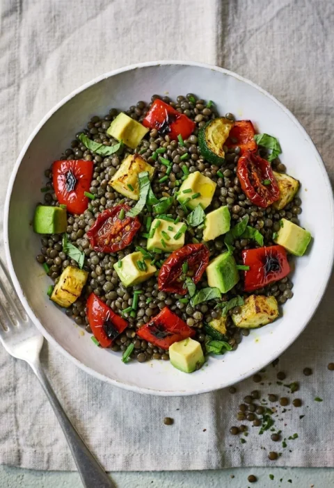 Puy lentil salad with roasted peppers, courgettes, avocado and chives