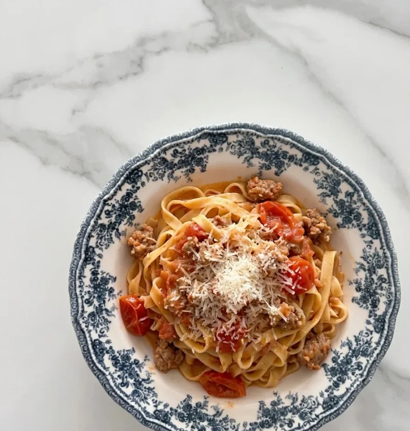 Gordon Ramsay sausage pasta with tagliatelle, crumbled Italian sausage and cherry tomatoes