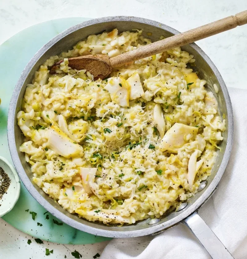 Gordon Ramsay smoked haddock risotto with leeks, chives and Parmesan in a pan