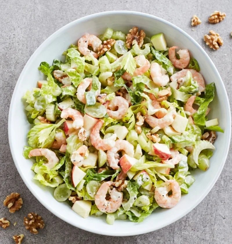 Prawn Waldorf salad with shredded romaine, green grapes, apple and toasted walnuts