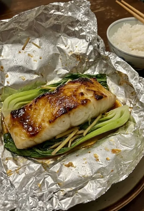 Gordon Ramsay Chilean sea bass with miso glaze baked in foil with bok choy and ginger
