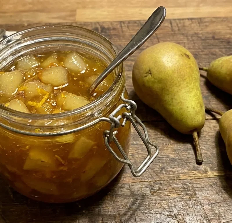 Gordon Ramsay pear and saffron chutney in a glass jar with chunky pear pieces and golden saffron colour