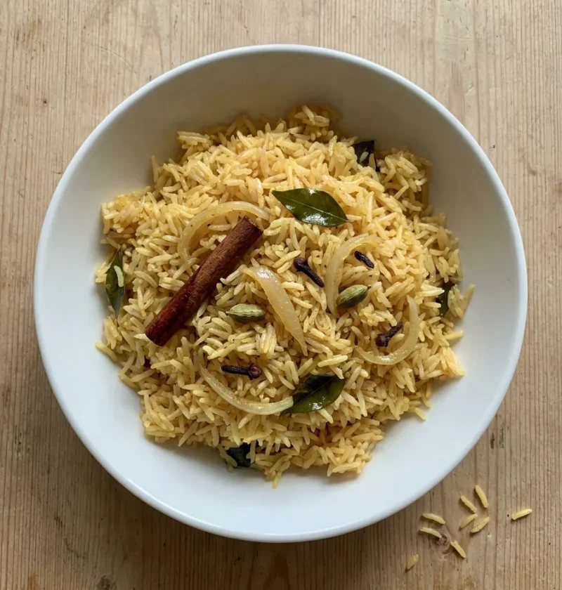 Gordon Ramsay pilau rice with saffron cinnamon cardamom and curry leaves in a white bowl