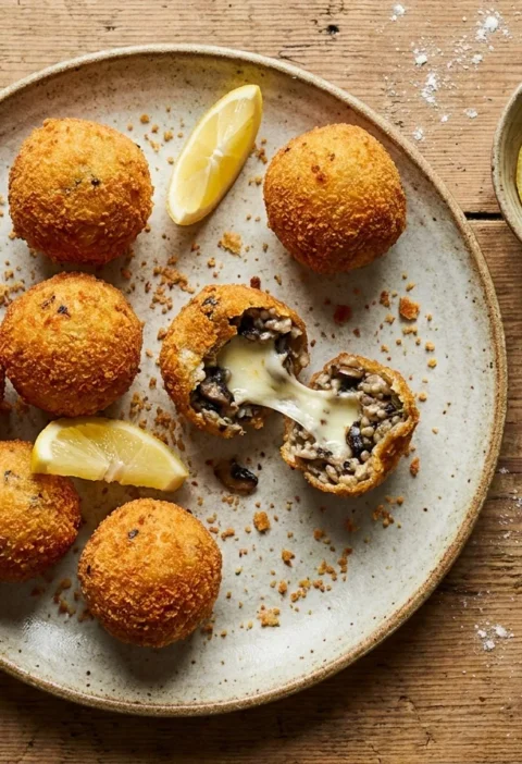 Gordon Ramsay arancini fried risotto balls with melting mozzarella and lemon