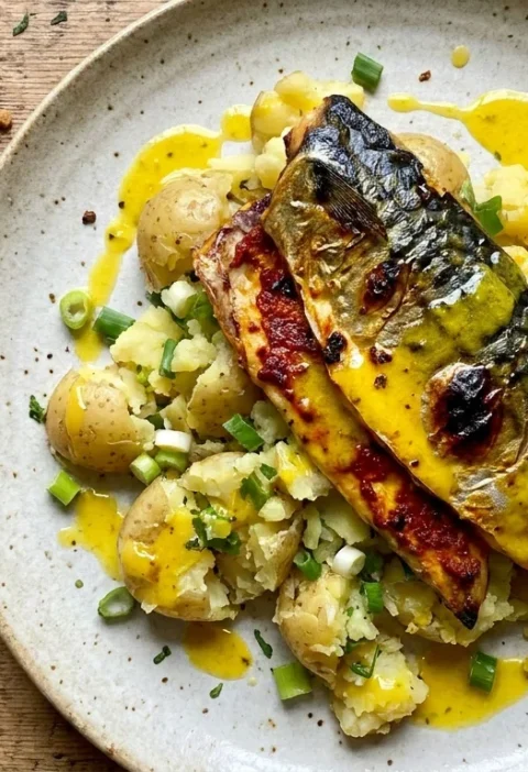 Gordon Ramsay roasted mackerel with garlic paprika paste on crushed potatoes with saffron vinaigrette