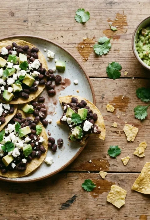 Gordon Ramsay spicy black beans on tostadas with feta avocado and lime